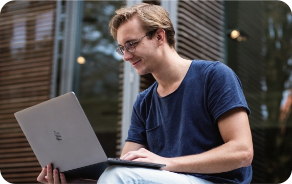 a man with a laptop